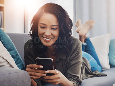 Buy stock photo Happy woman, relax and cellphone on couch for social media, reading and streaming in home. Blog, smile and female person in living room or lounge for connection, scroll and mobile app for networking