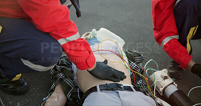 Buy stock photo Healthcare, outdoor and paramedic with patient, helping and hand on stomach, check and oxygen mask. Street, teamwork and rescue of person, EMS and palpate of abdomen, accident and first responder