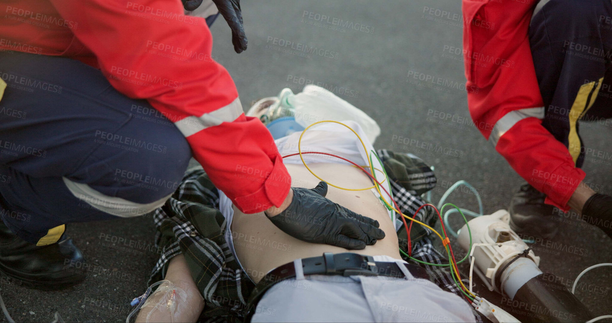 Buy stock photo Healthcare, outdoor and paramedic with patient, helping and hand on stomach, check and oxygen mask. Street, teamwork and rescue of person, EMS and palpate of abdomen, accident and first responder