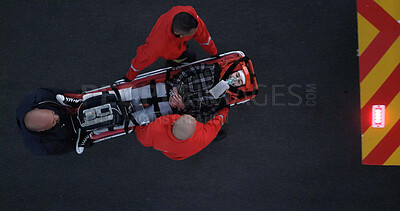 Buy stock photo People, paramedic and above with patient in outdoor on scene for emergency, rescue and support. Emt team, healthcare and oxygen mask for injured person on accident,  medical service and first aid