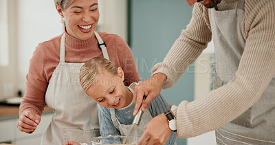 Buy stock photo Happy family, child and baking with bowl for mixing ingredients, bonding or hospitality together in kitchen at home. Mother and father helping daughter, kid or little girl with whisking for dessert