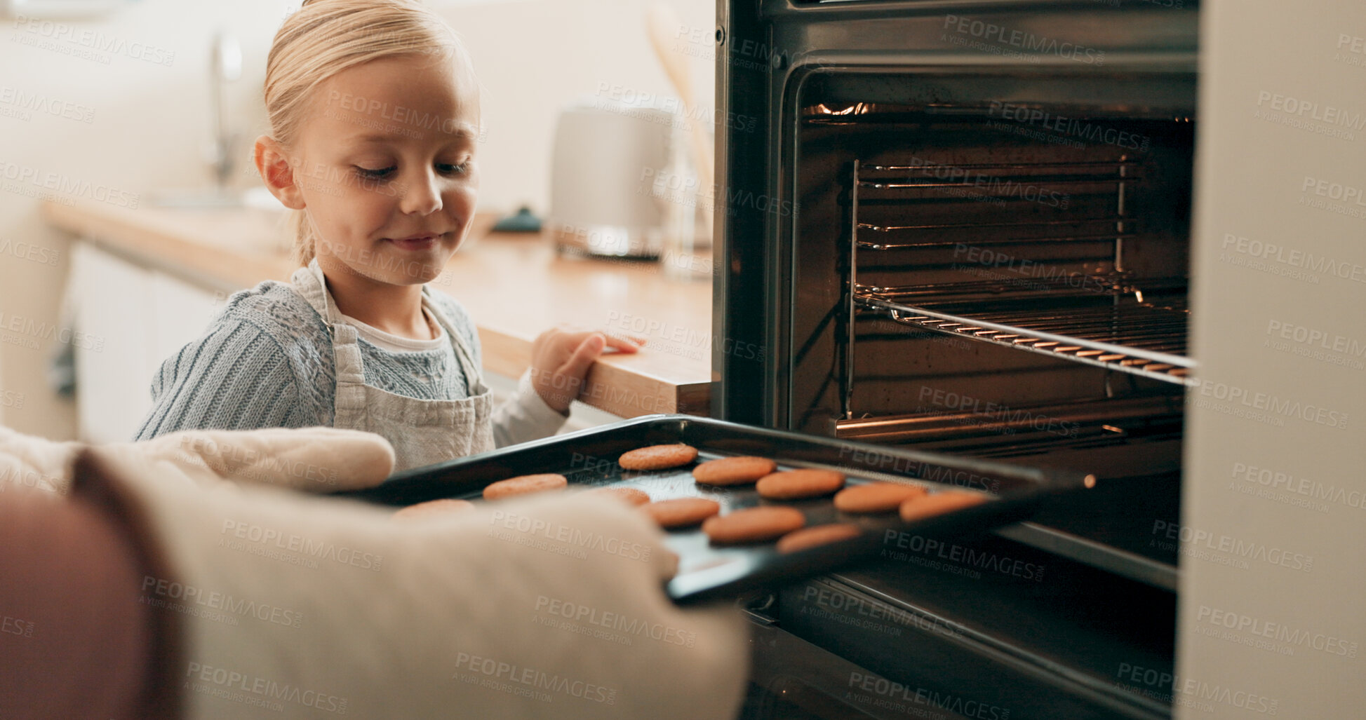 Buy stock photo Girl, cookies and oven for baking in kitchen with help, home or dessert of sweet snack. Biscuits, hot and gloves for cooking and food for school bake sale, child or female person for bonding together