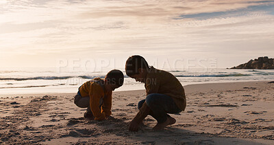 Buy stock photo Boy, children and beach to play with sand, vacation and outdoor in nature with bonding, care and love. Family, kids and mockup space by ocean, sky and start foundation on ground for castle in Miami