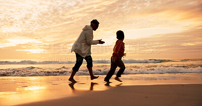 Buy stock photo Dad, son and running on beach at sunset for family bonding, travel for wellness with games. Father, boy child and together by ocean with sand on vacation, fun adventure or freedom in Indonesia