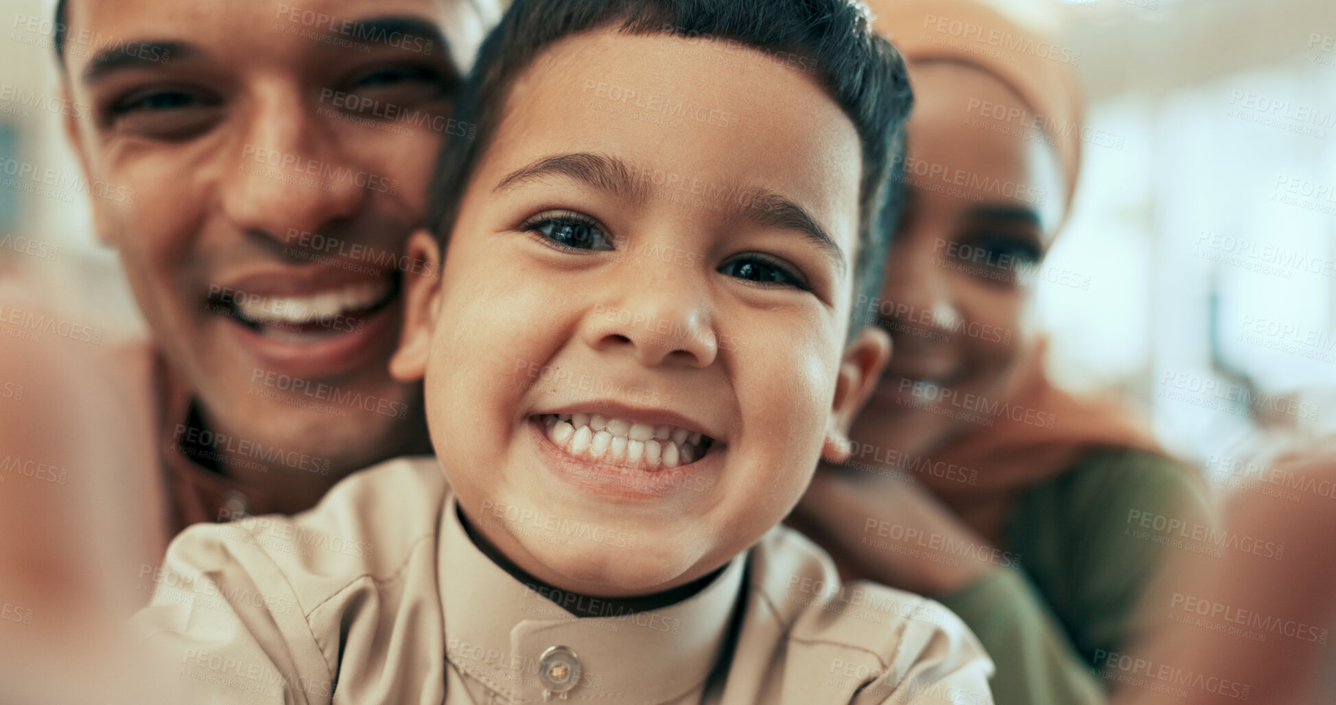 Buy stock photo Muslim family, smile and portrait selfie in house, together and bonding with boy. Hijab mother, father and picture for islamic new year memory, celebration and silly capture for Muharram mubarak
