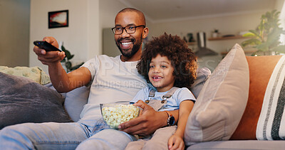 Buy stock photo Dad, boy and happy with television or popcorn on sofa in living room for movies, cartoon and entertainment. People, parent and smile with kid on couch for streaming platform with child development