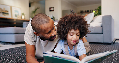 Buy stock photo Reading, dad and child with book on floor for education, learning or language development in living room. Love, African man and girl lying on rug for literacy, storytelling or knowledge in home