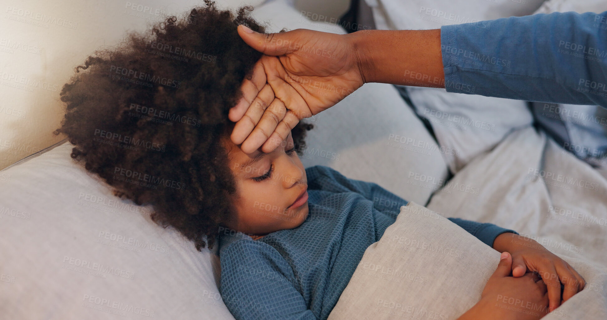 Buy stock photo Home, bed and sick kid with hand of parent for high temperature or flu and ill at night. House, people and fever in bedroom with allergy, cold and virus or disease with care, support and trust