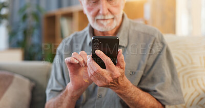 Buy stock photo Senior man, phone and typing on sofa for web surfing with retirement, chess game and connection in home. Elderly person, mobile and relax with ebook app, online puzzle and internet scroll in lounge