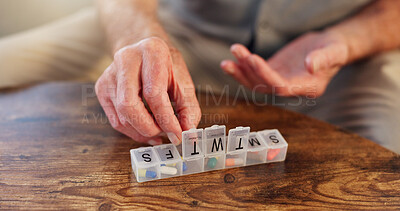 Buy stock photo Pills, container and hands with medicine, table and healthcare for elderly person, medical and home. House, pharmaceutical and healthy for old man, closeup and storage for supplement of treatment