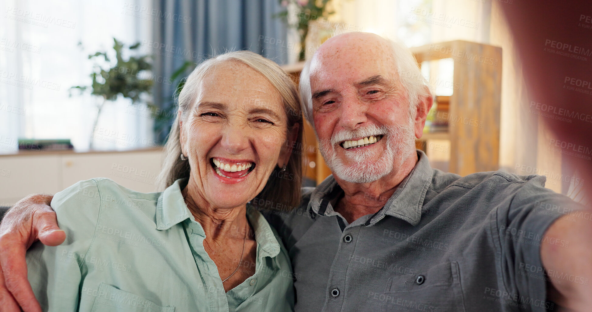 Buy stock photo Senior, man and women with selfie in home for profile picture, love in apartment for retirement. Elderly, happy couple and together in house for face photography, bonding with smile for relationship