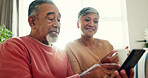 Home, smile and senior couple with tablet for network, communication and bonding in morning. Woman, man and happy in love with technology in living room for online news, digital media and retirement