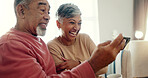 Laugh, phone and senior couple in home together for funny joke, meme or reading comedy story. Retirement, man and woman on mobile in lounge for news, streaming video and relax for connection on email