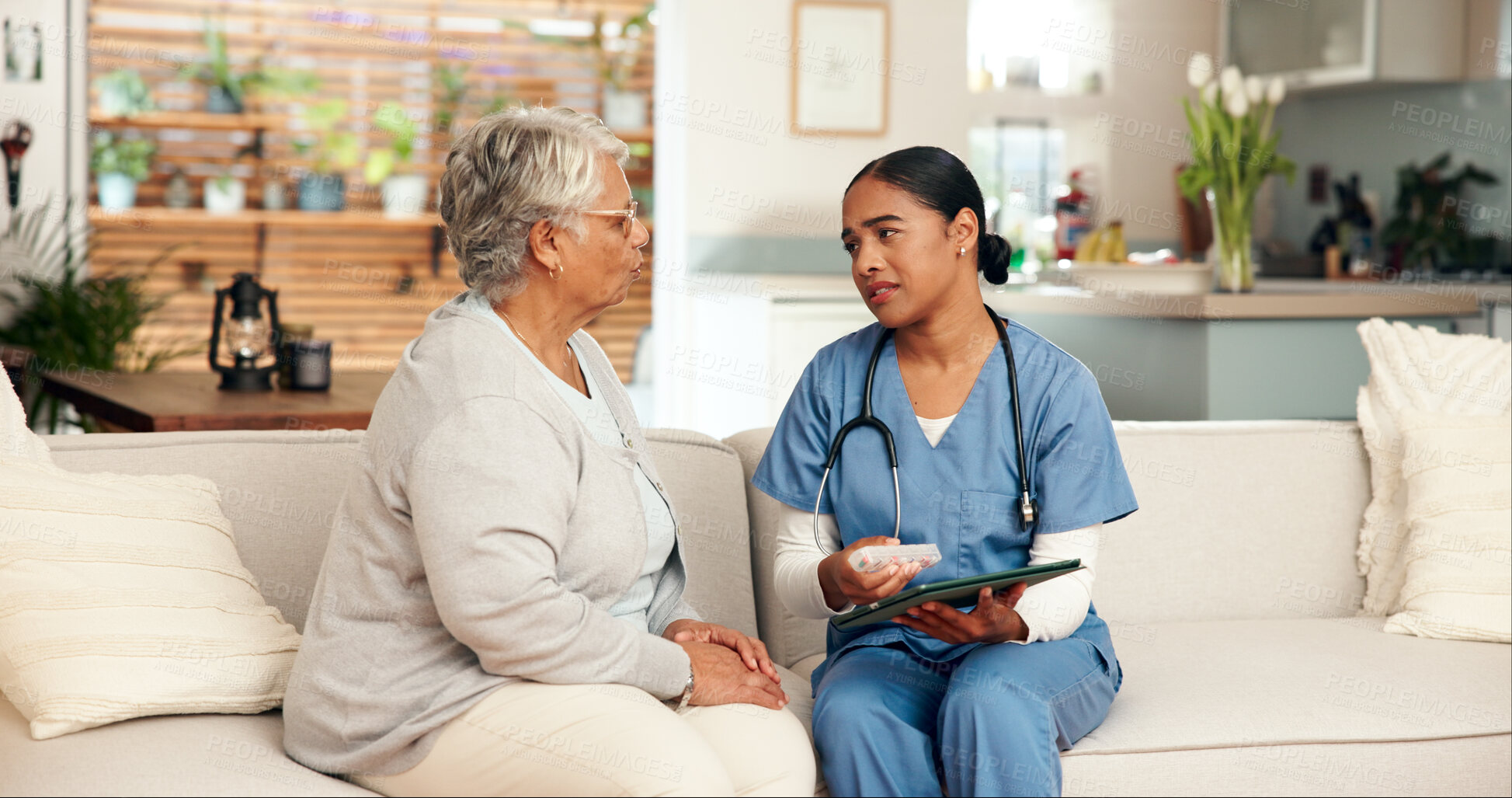 Buy stock photo Home, old woman and nurse with tablet, pills and conversation with cancer diagnosis. Prescription, medical or elderly lady with professional, antibiotics and discussion for treatment, app or internet