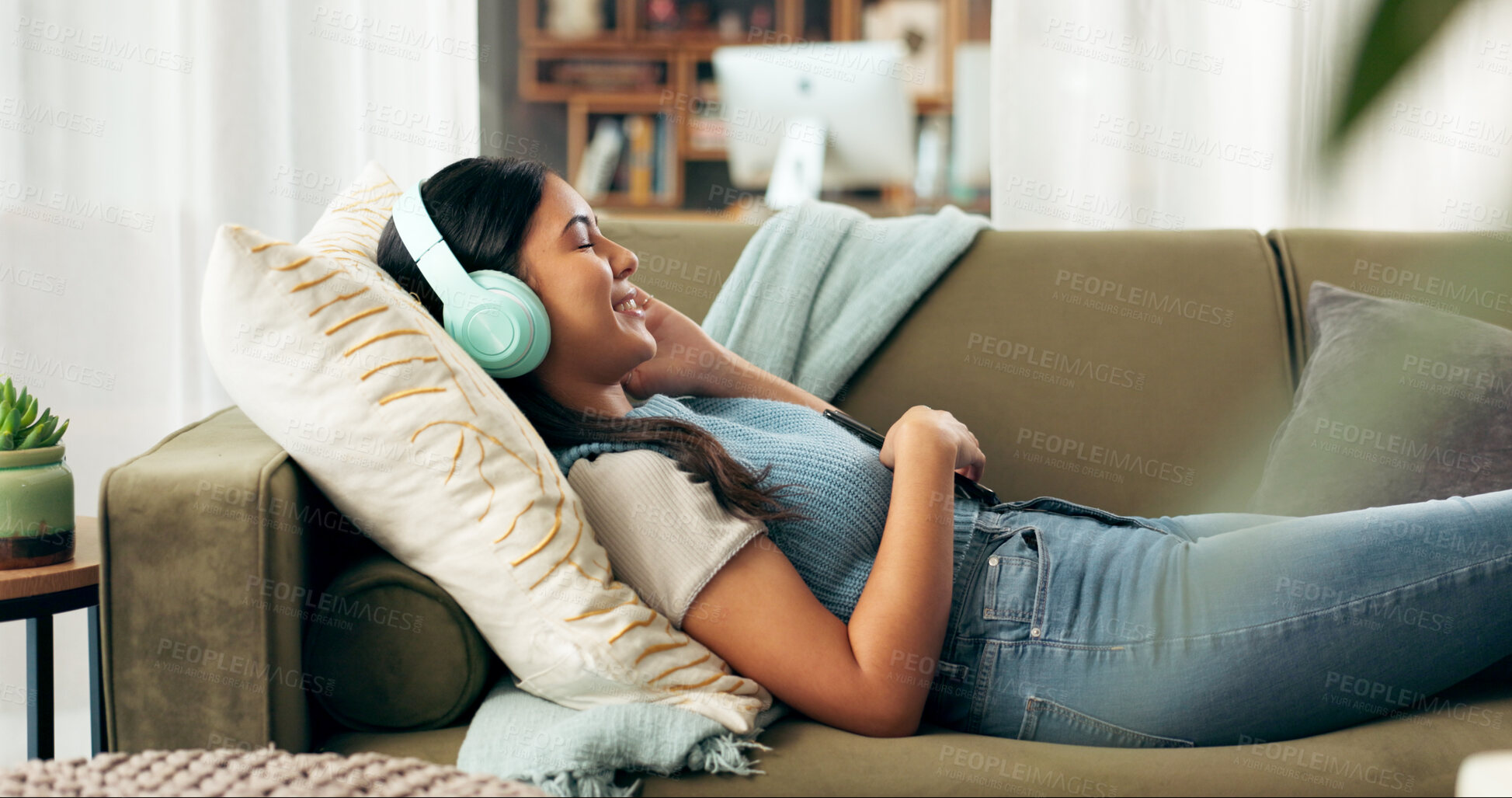 Buy stock photo Woman, home and eyes closed with headphones on sofa for music, playlist and entertainment. Female person, couch and smile in living room for audio or radio and streaming podcast for fun and relax