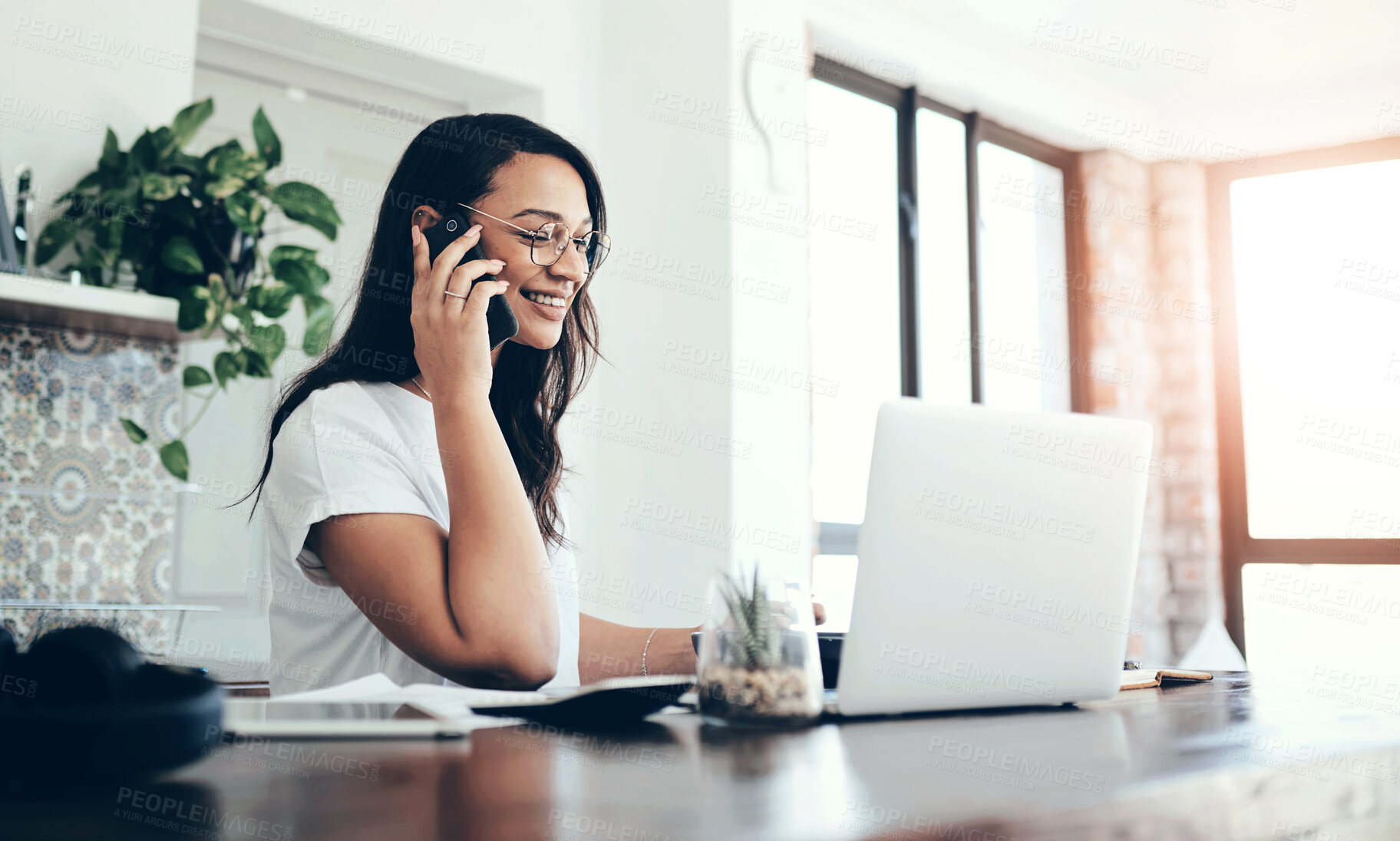 Buy stock photo Laptop, phone call and remote work with business woman in kitchen of home for communication. Computer, conversation and finance with accountant person in apartment for budget, investment or savings