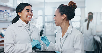 Women, laboratory and smile for science talk with technology for research, teamwork or support for pharma. Female leader, scientist or collaboration with mentor for medical innovation or breakthrough