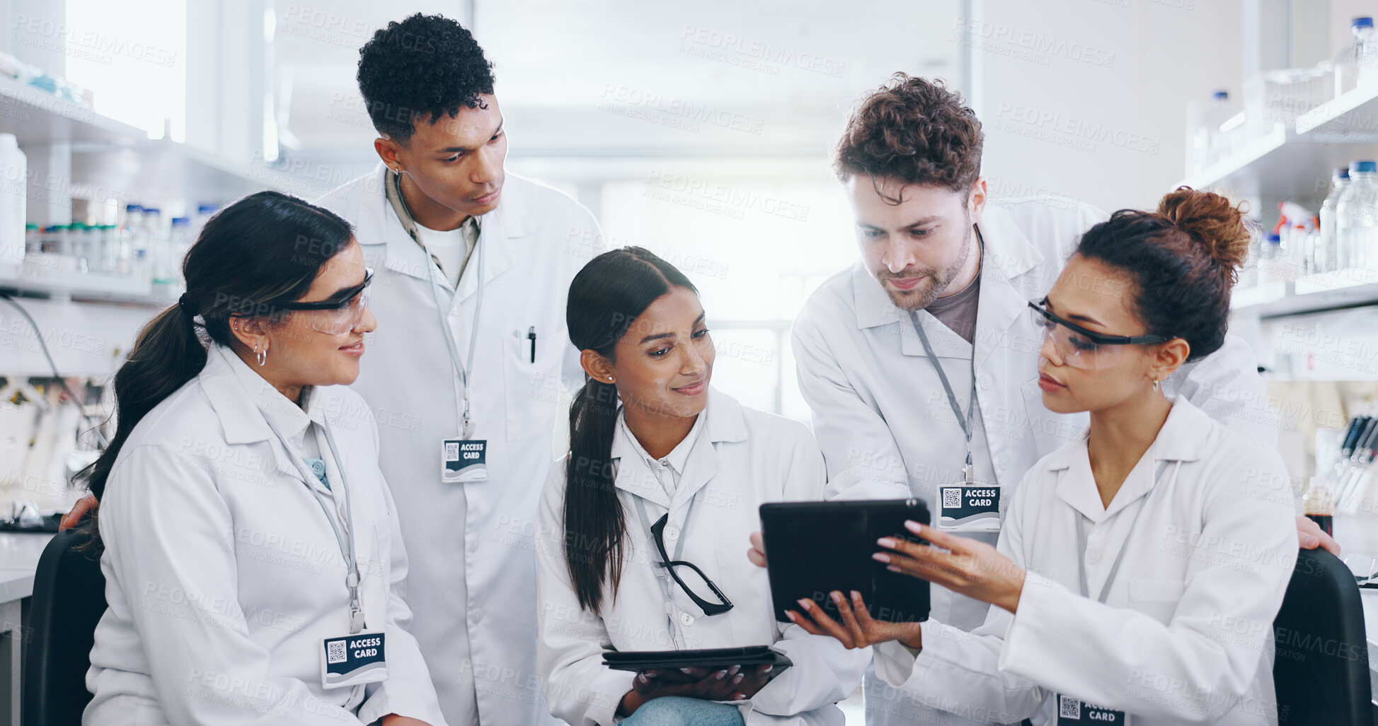 Buy stock photo Tablet, science and group of people for learning, cancer cure or medical development in laboratory. Training, investigation and research with scientist team in clinical trial for medicine internship