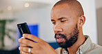 Cellphone, reading and black man for online and shocked, news and current affairs for website report. Technology, mobile app and connected for male person, social media and article on war and crisis