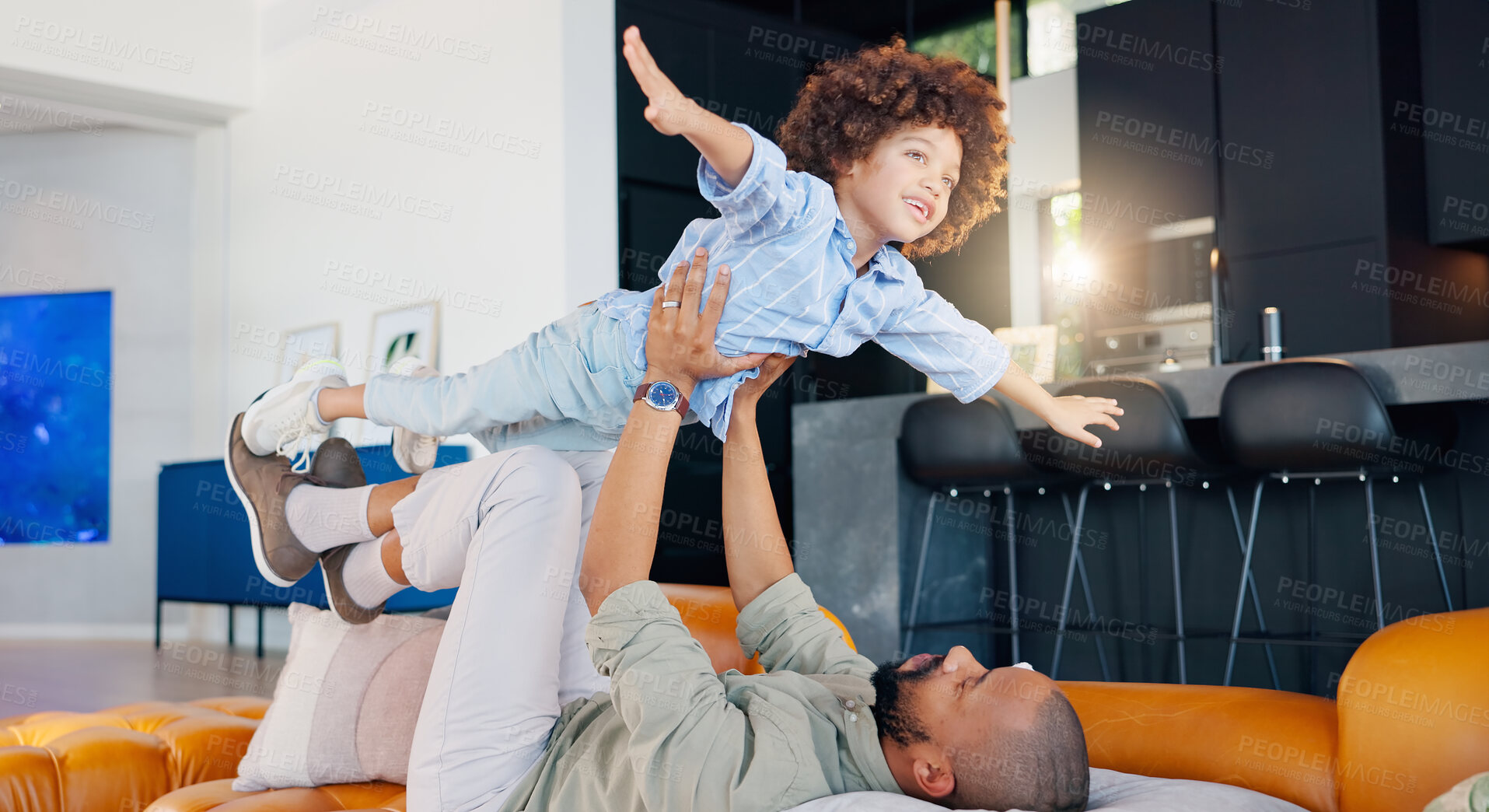 Buy stock photo Airplane, playing and dad with child, lounge and bonding in house, fun and break for games with son. Living room, boy and father in home, family and youth with parent, weekend and flying in air