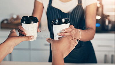 Buy stock photo Closeup shot of a barista serving coffee to a customer in a cafe