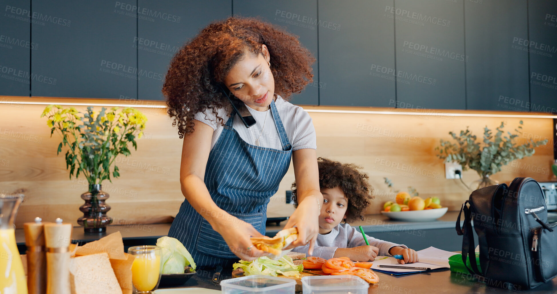 Buy stock photo Mother, child and phone call in morning with food or prepare lunch for son, talking and multitasking for time management. Mom, boy kid and writing in home before school, daily routine and healthy.