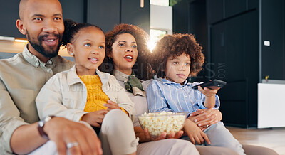 Buy stock photo Family, children and watching tv together in home for bonding, streaming movies and entertainment with popcorn. Parents, kids and television broadcast with change channel, snack and support for care