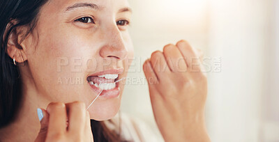 Buy stock photo Home, flossing and woman with dental hygiene, wellness and oral health with morning routine. Person, bathroom and girl with string, product or grooming with cleaning, teeth whitening or remove plaque