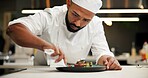 Man, chef and serious with plate in kitchen at restaurant for fine dining, meal and creativity. Male employee, professional and cooker with food for culinary, hospitality and catering service