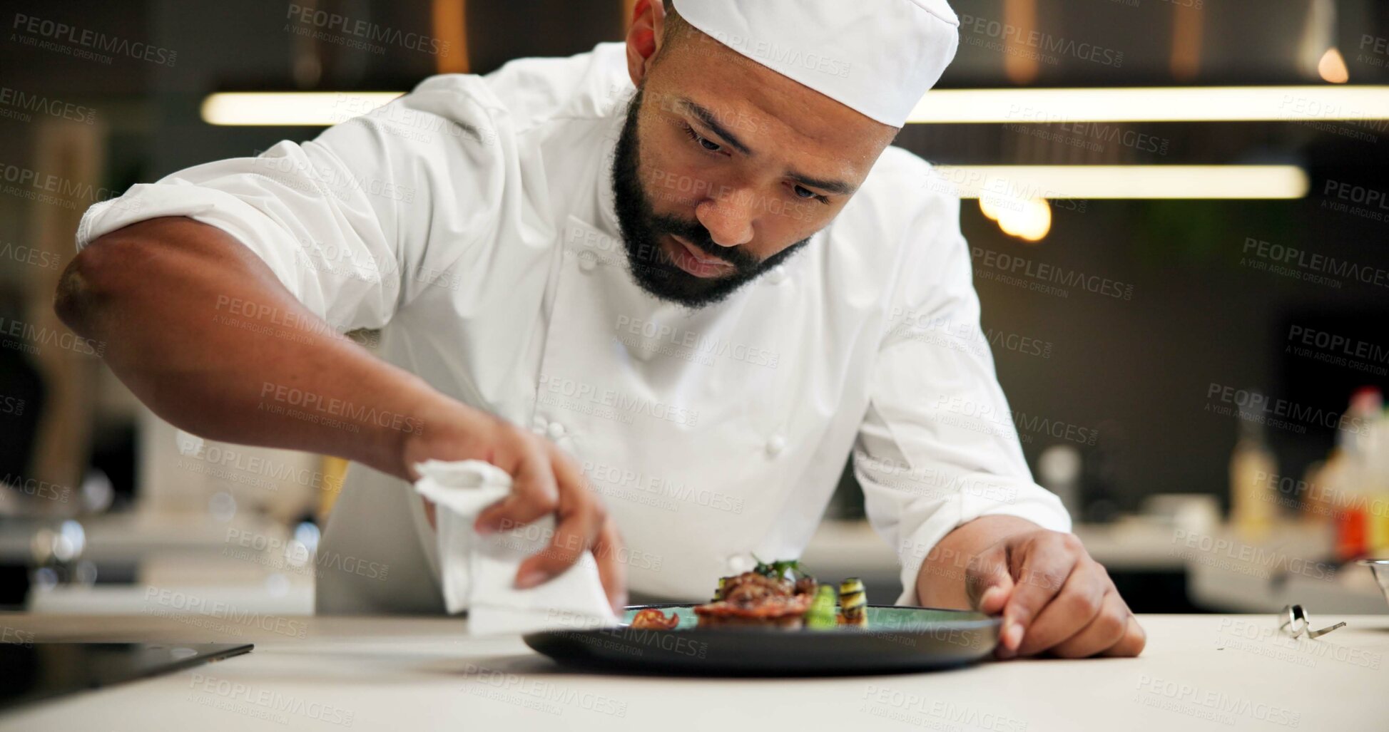 Buy stock photo Man, chef and serious with plate in kitchen at restaurant for fine dining, meal and creativity. Male employee, professional and cooker with food for culinary, hospitality and catering service