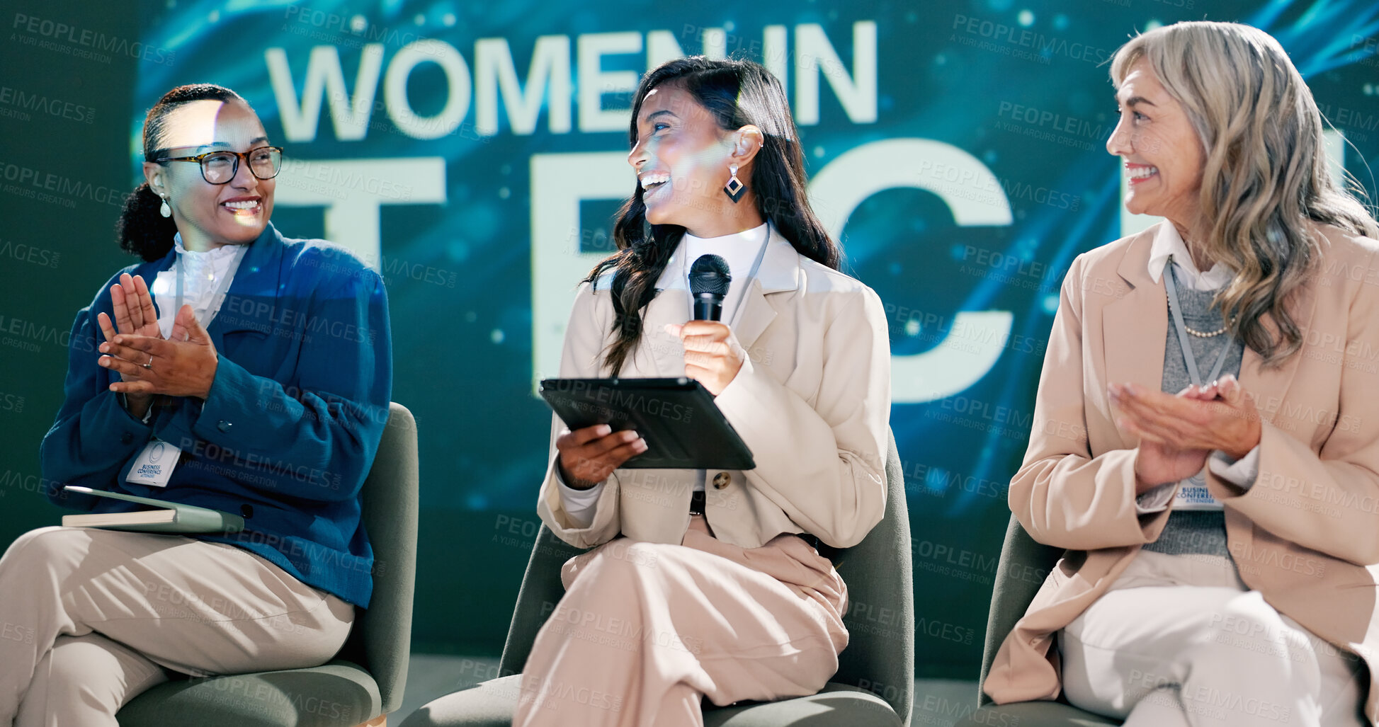 Buy stock photo Clapping, seminar and group on stage, speaker and motivation for gender equality, empowerment and speech. Tablet, online and presentation for female employees in technology, talk and success of women