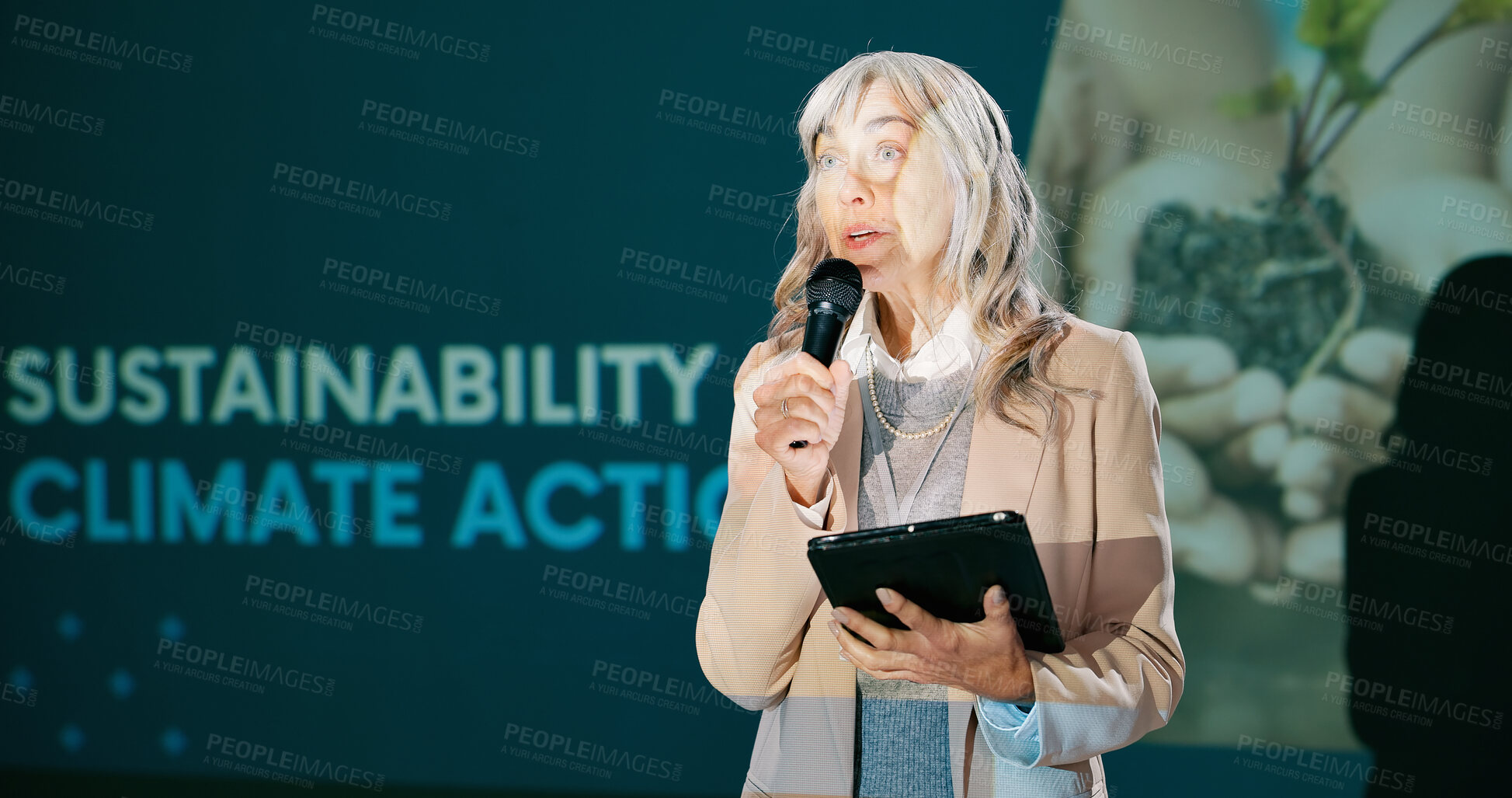 Buy stock photo Presentation, business woman and tech with microphone for climate change, plants sustainability and resilience. Speaker, presenter or mature agro ecologist with tablet, search or educational workshop