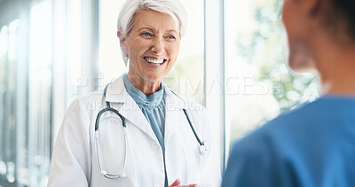 Buy stock photo Meeting, discussion and doctor with nurse in hospital for treatment planning in collaboration. Conversation, internship and woman healthcare mentor with medical student for feedback on clinic work.