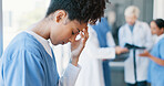 Black woman, nurse and anxiety in burnout, grief or mistake against glass window in hospital building. Frustrated physician, medical healthcare and person in stress, loss or headache at clinic