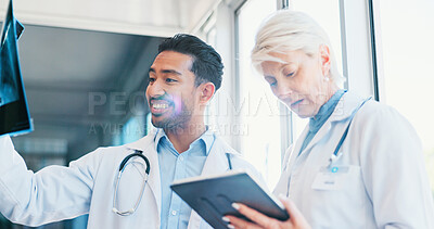 Buy stock photo Doctors, x ray and medical analysis in hospital, professional consultation and teamwork collaboration for patient results. Mature radiologist, tablet and researching or diagnosis, people and wellness