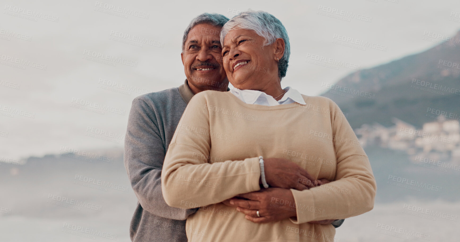 Buy stock photo Hug, love and senior couple on beach together for holiday bonding, retirement or vacation. Romance, smile or thinking with elderly man and woman embracing on tropical island coast for peace or travel