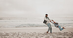 Dad, kid and spinning on beach for play, fly fantasy and bonding on vacation in Puerto Rico. Father, child and fun on seaside with trust, relationship development and energy to keep warm on holiday