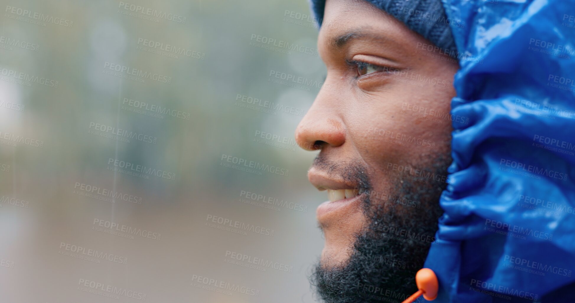 Buy stock photo Thinking, black man and raincoat for winter outdoor on camping adventure, idea and planning. African, male person profile and rain for travel closeup, hiking and mockup explore of morning forest