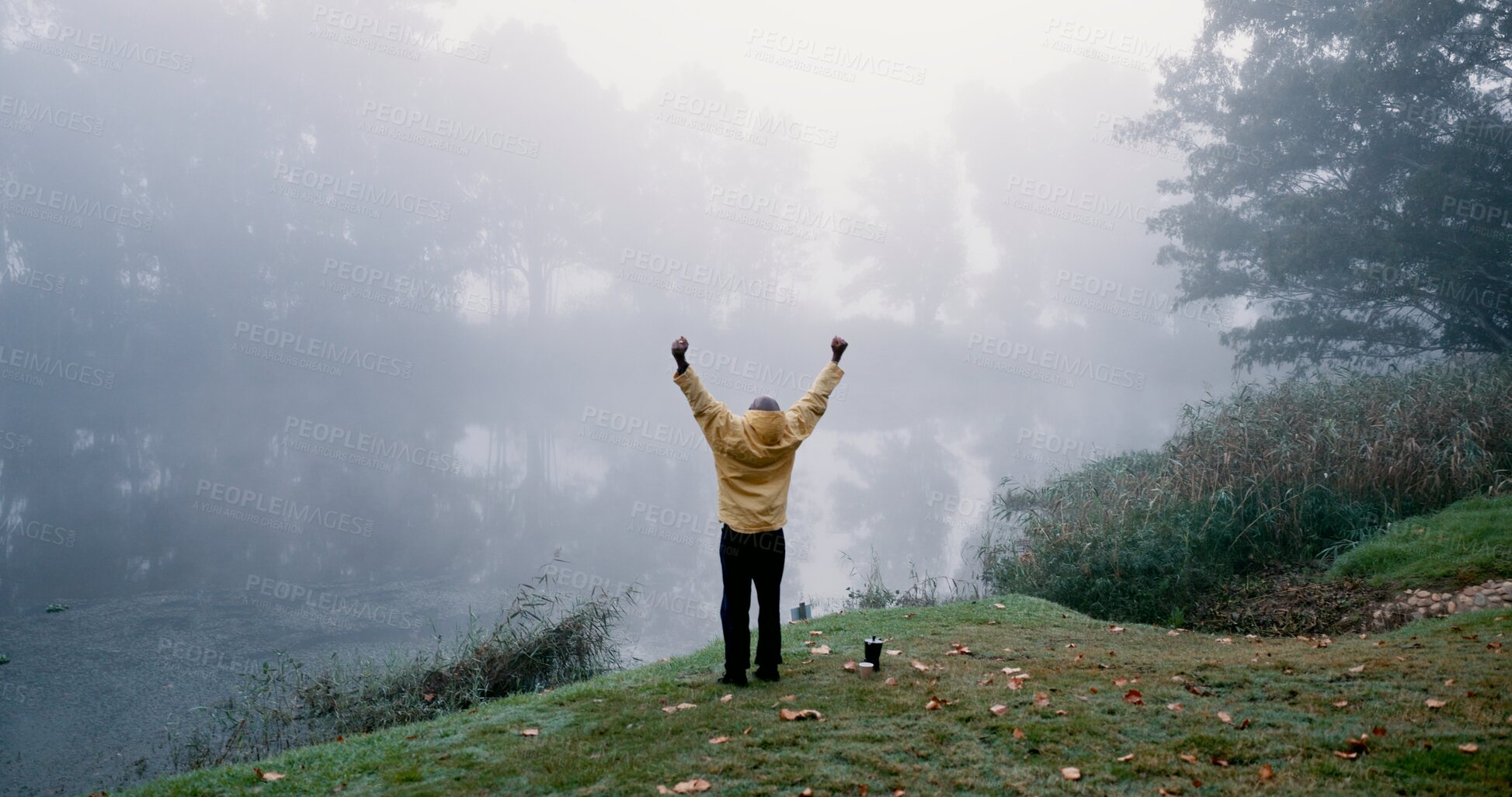 Buy stock photo Black man, freedom and rain for travel outdoor on camping adventure, explore and nature journey in morning. African, male person and enjoy for forest, hiking and trekking woods for winter vacation