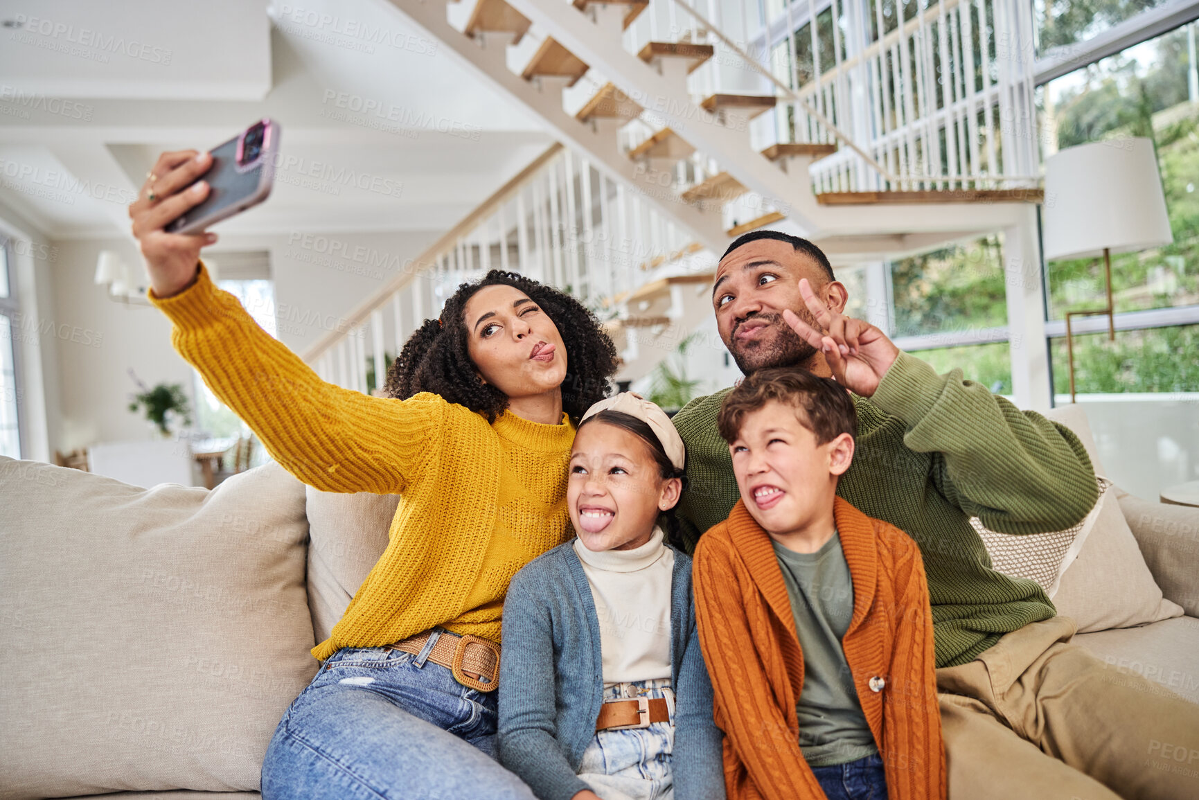 Buy stock photo Selfie, happy family and expression in home with parents, kids and lounge in bonding together. Mom, dad and siblings in house for memory, photography and funny faces for childhood, nurture and growth