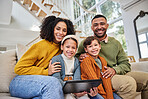 Portrait, happy family and tablet in home with mom, dad and kids in lounge for streaming movies. People, tech and house for educational games, learning and childhood development as parents on couch