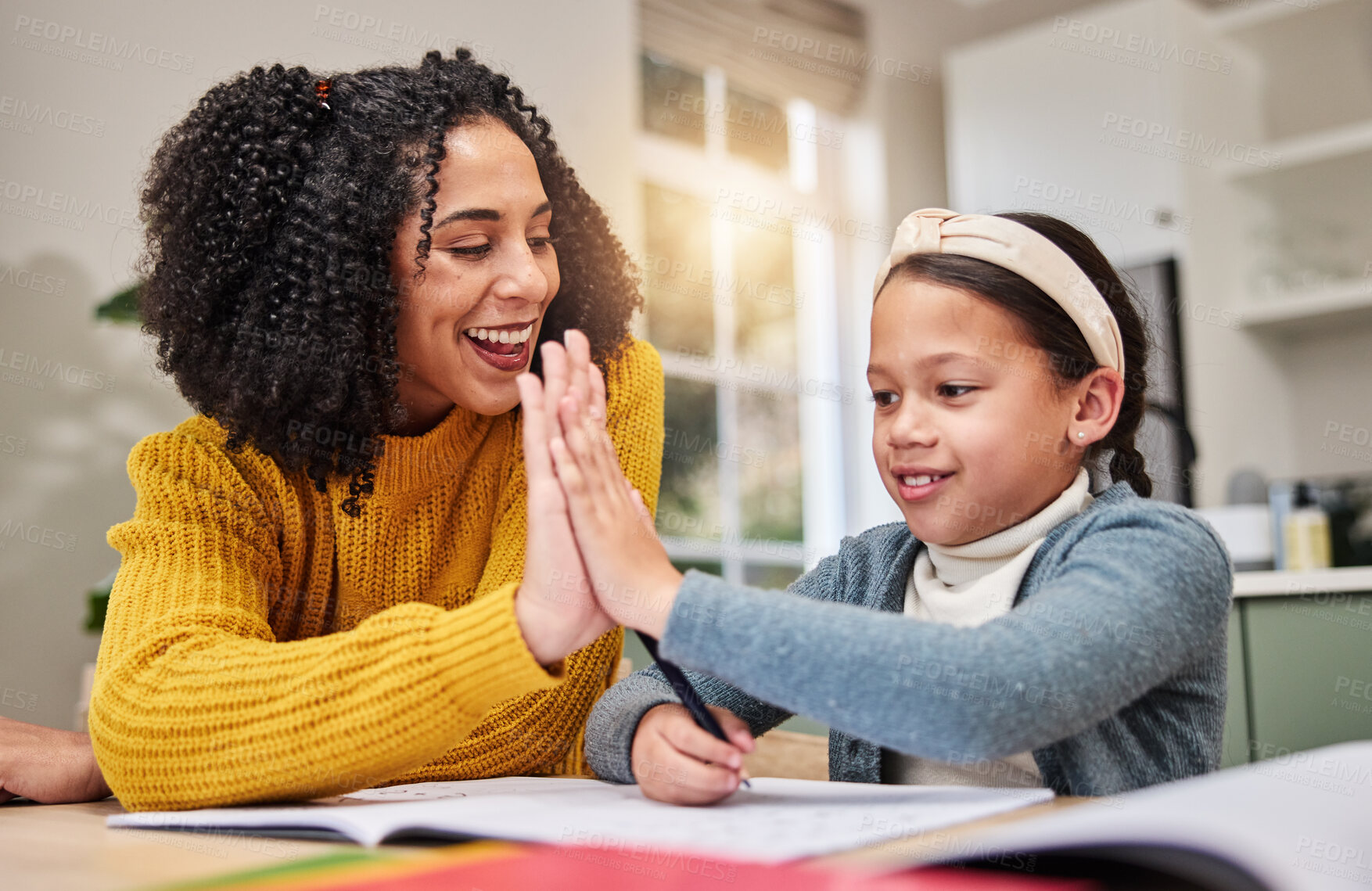 Buy stock photo Mom, smile and high five with girl for homework, correct answer and learning math in home. Mama, daughter and excited with palm connection for education, celebration and success for teaching equation