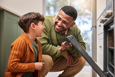 Buy stock photo Happy, boy and dad by oven in kitchen for baking, activity and learning to cook with love for handmade meal. Father, son and together in family house for bonding or growth, development and teaching.