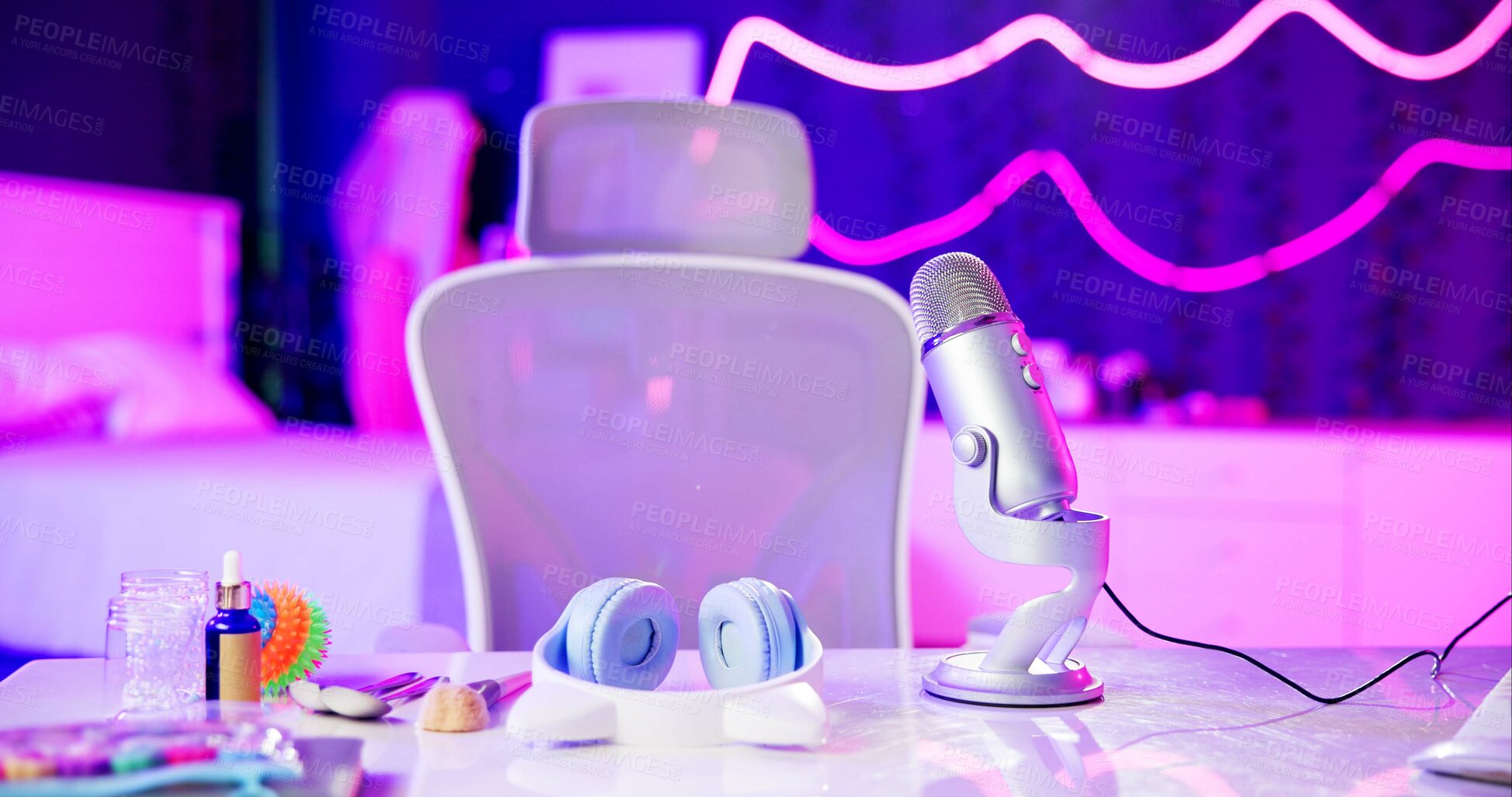 Buy stock photo Home, studio and microphone on empty desk for live streaming, podcast or recording in neon bedroom. Audio, ASMR and workplace of streamer, influencer or content creation with sound production tools