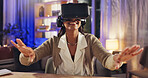 Virtual reality, happy and woman in home at night for online games, entertainment and metaverse. Technology, hands and happy person with vr goggles for AI experience, cyber network and streaming