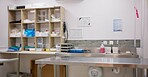 Empty room, vet and pet clinic with equipment for animal care, sanitary or domestic healthcare. Interior of medical facility, shelter or veterinary center with operating table, tools or products