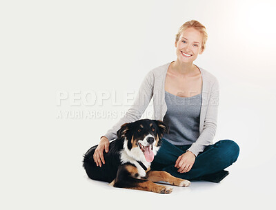 Buy stock photo Woman, dog and portrait with smile in studio for bonding, teaching tricks and together on white background. Owner, border collie and pet animal for obedience training, trust and friends with love