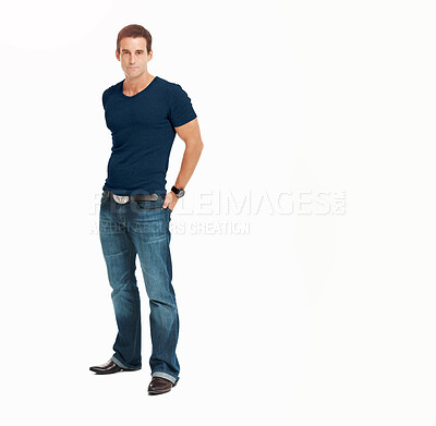 Buy stock photo Portrait, fashion and serious with man in studio isolated on a white background for classic style. Mockup, confident and trendy young model with strength in a t-shirt or masculine clothes outfit 