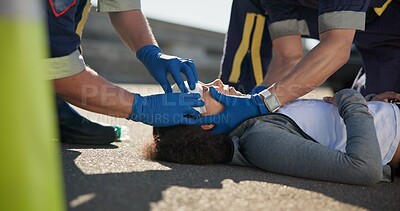 Buy stock photo Paramedic, accident and hands on head injury on road in car crash emergency with healthcare people. EMS, wrapping bandage or first responder with victim or rescue in street for transport to hospital