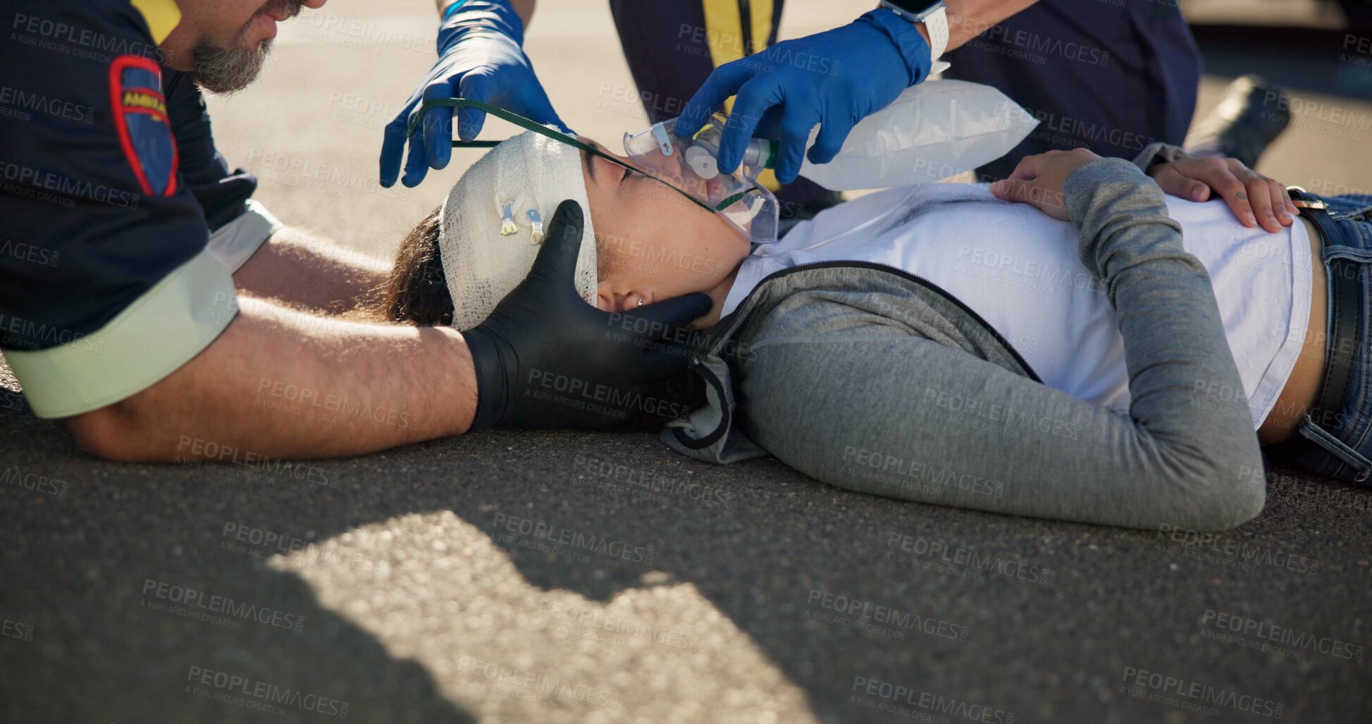 Buy stock photo Person, accident and emergency on street with oxygen for life support, medical response to trauma with ventilation. Safety, first aid or health insurance or air mask for breath on road, ems or crisis